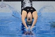 US swimmer Missy Franklin dives in at the start of the women's 100m backstroke final